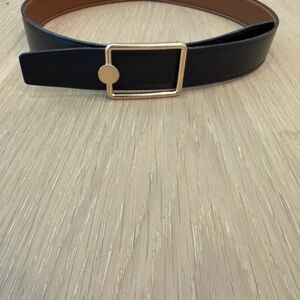 Hermes gold and black belt. buckle and reversible leather strap 32mm